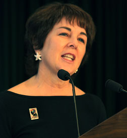 Diane Croft of National Braille Press, wearing a Louis Braille lapel pin, expresses her appreciation for her award.