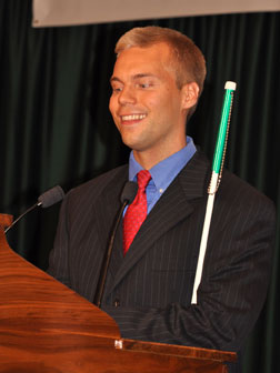 Beaming, Matthias Niska of Minnesota stands at the podium to address the banquet after he receives the $12,000 American Action Fund Scholarship.