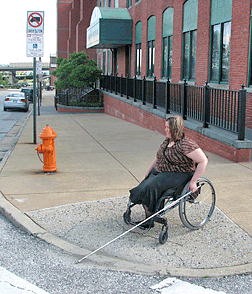 Treva safely travels wherever and whenever she pleases. Here she is pictured maneuvering into the curb cut in front of the National Center for the Blind in Baltimore.