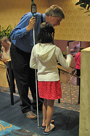 Jeff Altman demonstrates the use of the cane on stairs