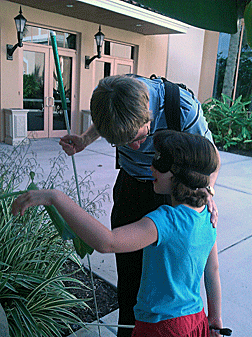 Jonathan Ice and Abby Duffy have an outdoor cane lesson