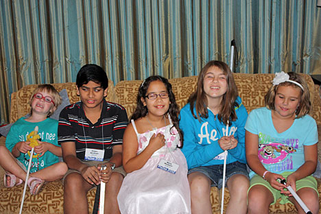 These winners of Braille Readers Are Leaders attended the 2012 convention (right to left): Alayna Hall, Kortnee Barton, Maria Monteiro-Oliveira, Shawn Abraham, and Emerie Mitchell-Butler.