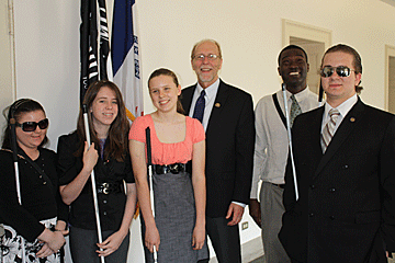 Callie Marshall, Jaden Messner, Beth Rouse, Dezman Jackson, and Alex Anderson are shown here with Congressman Dave Loebsack.