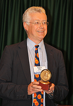 Stephen King of the DAISY Consortium holds his Bolotin Award.