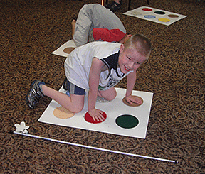 Boys playing Braille Twister