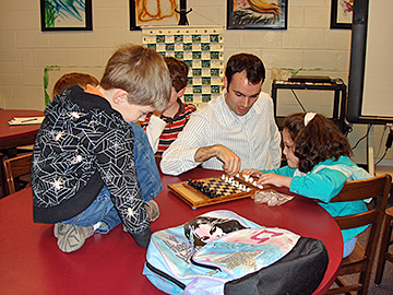 Kendra Holloway enjoying a meeting of her school's chess club