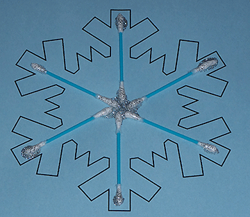 Snowflake enhanced with glitter-tipped Q-tips.