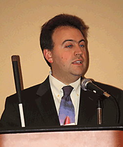 Mark Riccobono stands at the podium.