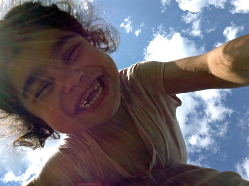 Anelia Schildbach wears a big smile, showing her missing front teeth.