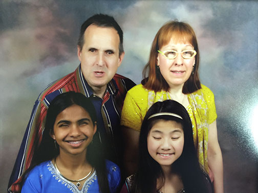 Paula and Alan Sprecher with their daughters, Rupa Elizabeth and Aihua Sprecher.
