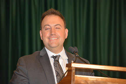 Mark Riccobono stands at the podium.