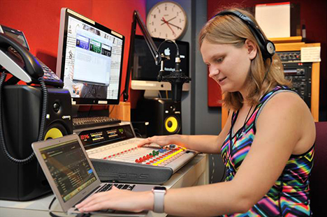 Alyssa Shock works at her college radio station.