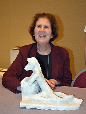 Deborah Kent Stein with her sculpture &ldquo;Transformation.&rdquo;