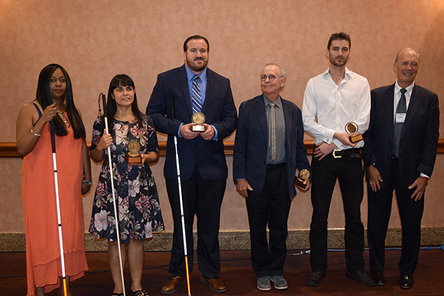 James Gashel stands with the five recipients of the 2019 Dr. Jacob Bolotin Awards.