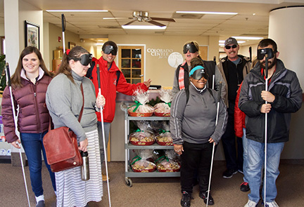 Students at the Colorado Center for the Blind prepare to deliver freshly baked cookies to staff and fellow students.