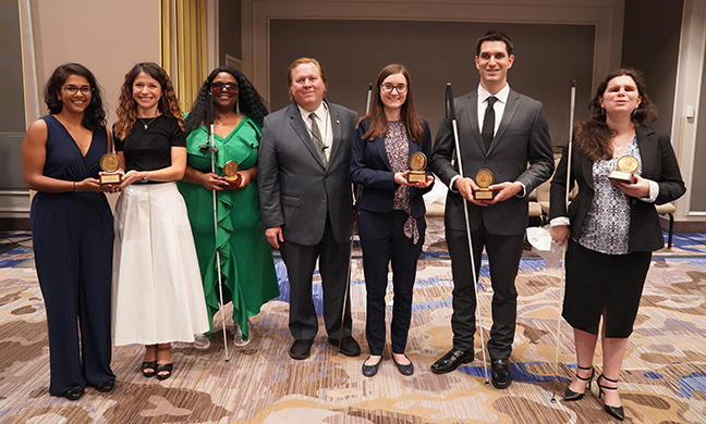 The Bolotin Award Winners: Shanta Danielle Arul and Elisa Beniero of Netflix, Jenetta Price of Blind Girl Magic, Everette Bacon (presenter), Caroline Karbowski of See3D, Tyler Merren of ReVision Fitness, and Karen Anderson accepting for 64 Ounce Games.