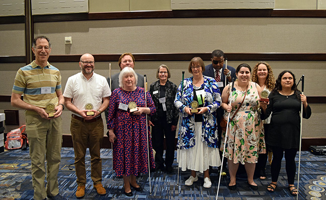 Everette Bacon and Mary Ellen Jernigan pose with the 2023 Dr. Jacob Bolotin Award winners.