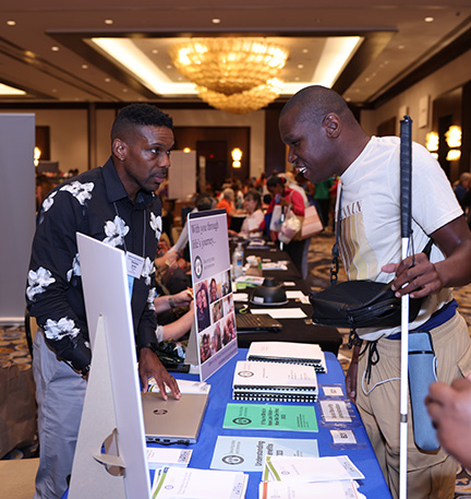 A Federationist talks to a representative from Social Security.