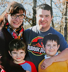 Cassie McKinney with her husband, Jamie, and their sons Robert and Timmy.