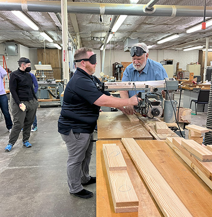 Justin Keller learns to use an electric saw at the Louisiana Center for the Blind.