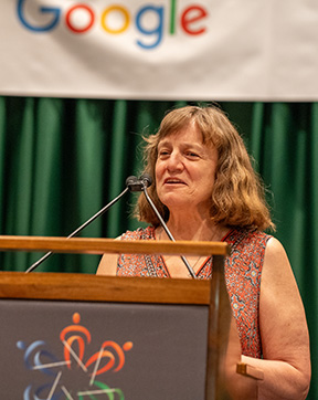 Amy Bower speaks from the podium.