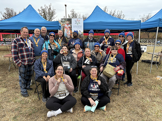 NFB participants wear their medals at the end of the Bay Bridge Run.
