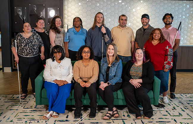 The 2024 IEP Seminar meets in the Ray and Diane McGeorge Living Room at the NFB Jernigan Institute.