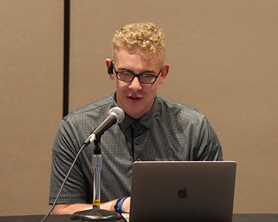 Zach Ledford speaks at the NOPBC Conference.