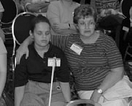 Anna Miller with mom, Sally Miller, at the 2001 NFB Convention.