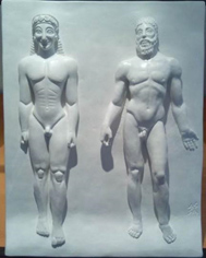 Kouros from Melos (left) and one of the Bronzes of Riace - Statue B (right), both originally examples of all-round sculpture. Bas-relief at Anteros Tactile Museum, Bologna, Italy. 