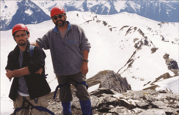 Craig [R] and his younger son Joshua scale a peak in the Canadian Rockies.