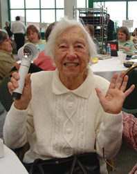 Catherine Greenwalt was very excited to receive a new magnifier as a door prize at the Possibilities Fair.