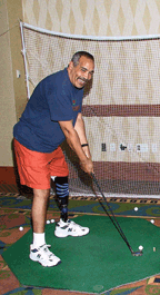 Charile Steele setting up a golf putt. Used with permission of the Amputee Coalition of America