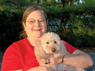 Ann and Yoda enjoy a cuddle
