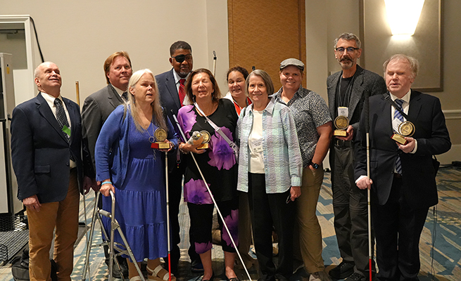 The 2024 Jacob Bolotin Award Winners: Deborah Kendrick, Donna Posont, Don Winiecki, Jonathan Mosen pose with members of the Bolotin Committee: Everette Bacon, Donald Porterfield, Jessica Beecham, Natalie Shaheen, and Mary Ellen Jernigan