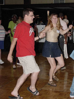 Marsh Smith and Susan Feazell dance at the Bluegrass Ball.