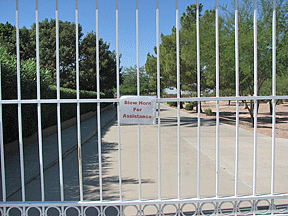 Visitors are urged to blow their horns for assistance when they arrive at the locked gates of the Eye Dog Foundation campus.