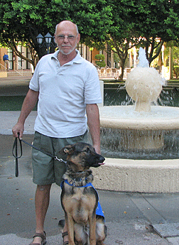 Puppy raiser Wallace Swerkes and his dog Kaiser