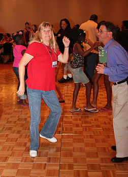 A couple dances energetically.
