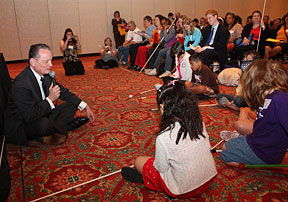 President Maurer sits down to talk with the kids about blindness.