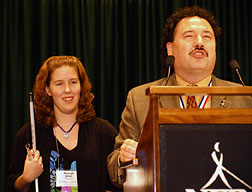 Parnell Diggs prepares to present the 2010 Imaginator of the Year Award to Kayleigh Joiner