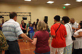 Among the many get-acquainted activities on Saturday evening were salsa lessons and a Latin dance party sponsored by the Sports and Recreation Division. Here instructors are really getting the crowd moving.