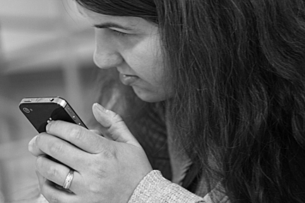 Nihal Erkan holds an iPhone. Photograph: Saabira Chaudhuri