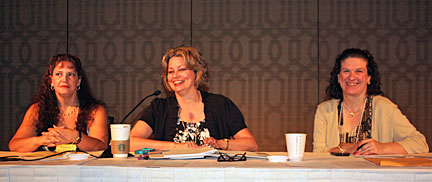 Stephanie Kieszak, Laura Bostick, and Carlton Walker look on as a panel discusses life in the mainstream.