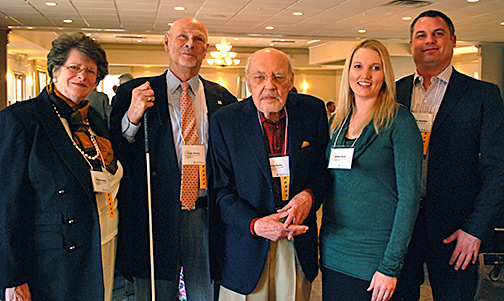 Shown here are, from left to right, Sharon Omvig, Jim Omvig, Jim Burke, Ashley Kielty (the scholarship recipient), and Mark Saunders at an awards ceremony at which the Judith Young Scholarship was presented.