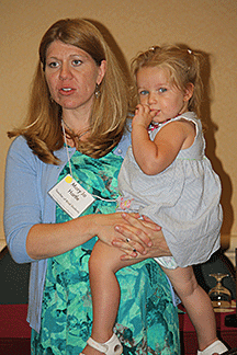 Mary Jo Hartle holds daughter Kayla