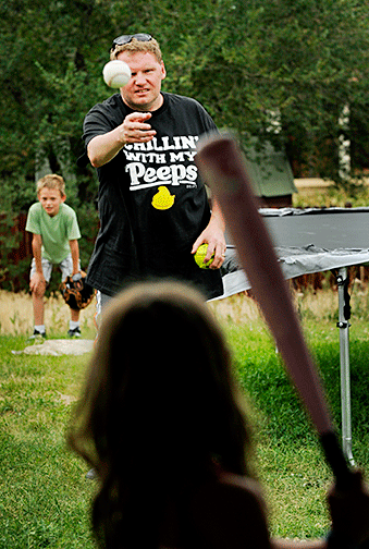 Brent playing baseball with Gavin and Sienna