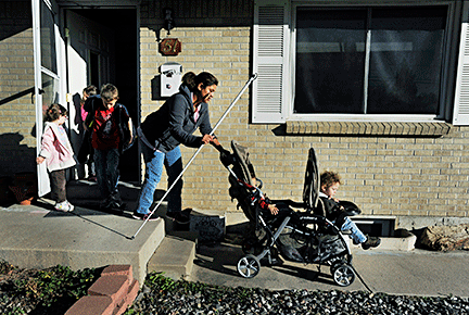 Ena and the kids leave the house for the day.