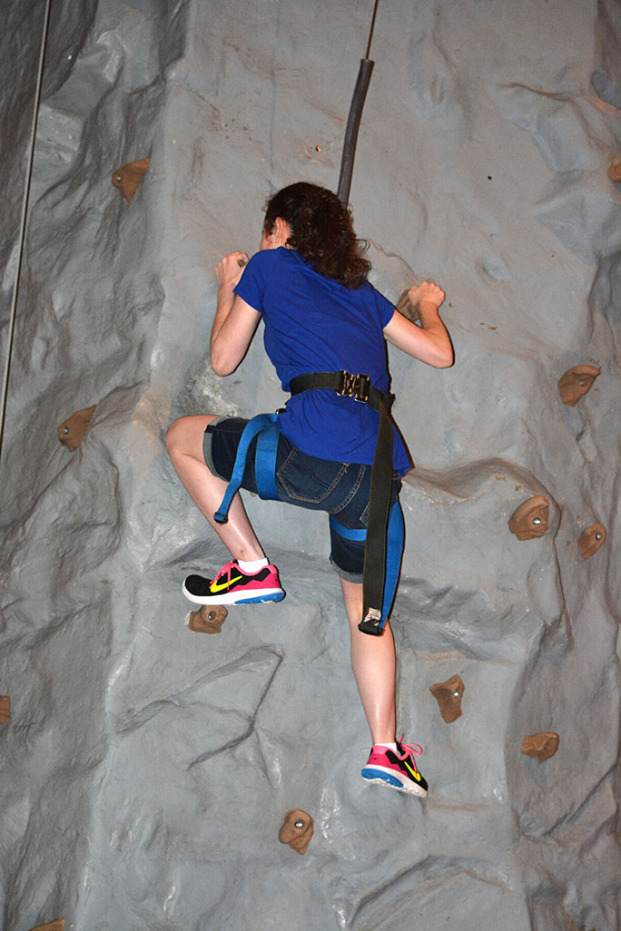 Megan Peoples (LA) scales the rock wall with confidence.