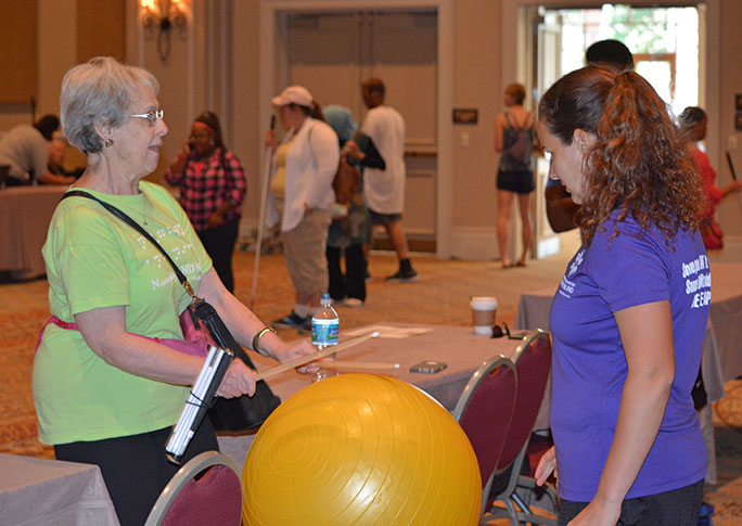 Frida Aizenman (NV) shows Jessica Beecham (CO) that rhythm knows no age.